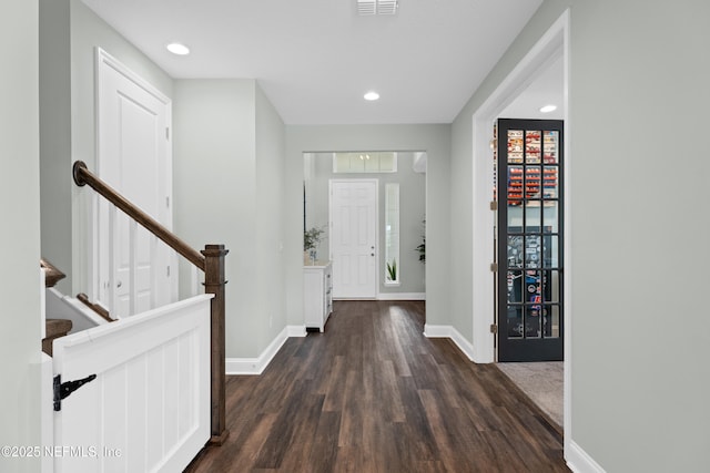 foyer entrance with visible vents, dark wood-style floors, recessed lighting, stairway, and baseboards