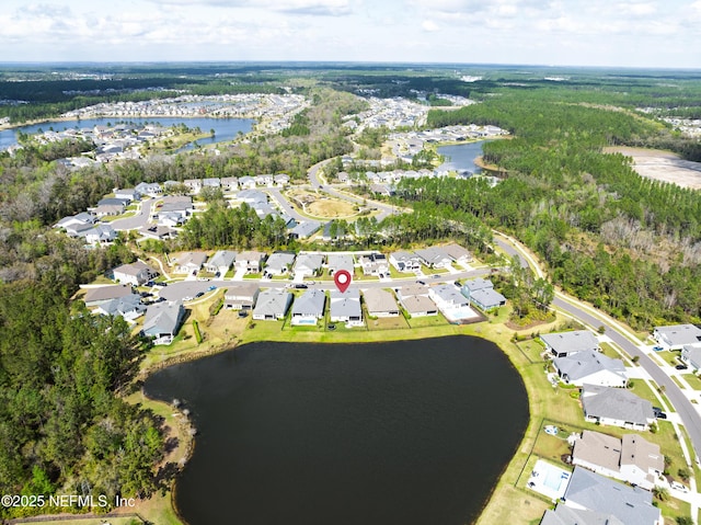 aerial view featuring a water view and a residential view