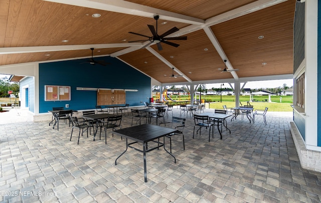 view of patio featuring ceiling fan and outdoor dining space