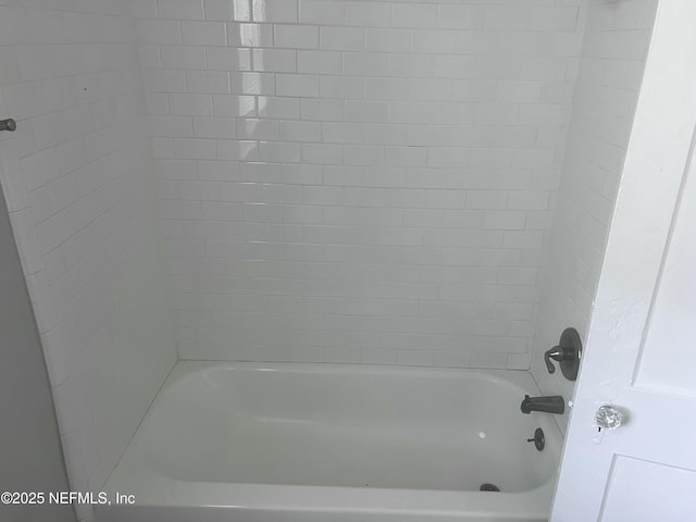 full bathroom featuring tub / shower combination