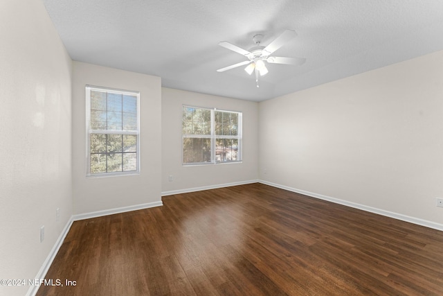 8120 Dandy Ave, Jacksonville, FL 32211 - empty room with ceiling fan, a textured ceiling, wood finished floors, and baseboards