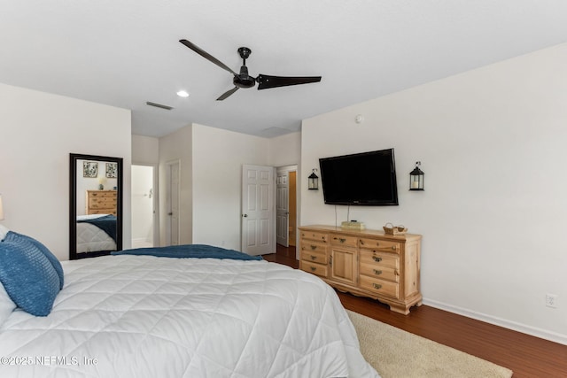 bedroom with baseboards, visible vents, a ceiling fan, wood finished floors, and recessed lighting