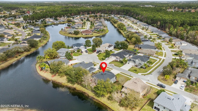 aerial view featuring a water view and a residential view