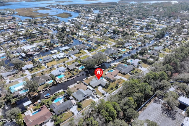 bird's eye view with a residential view and a water view