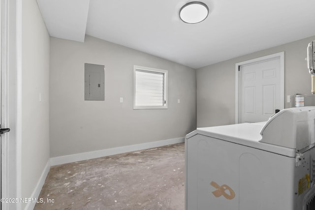 washroom with washer / clothes dryer, electric panel, baseboards, and laundry area