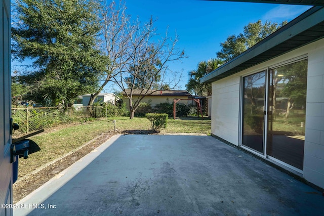 view of patio with fence