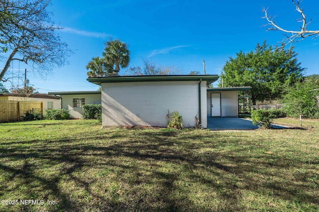 garage with fence