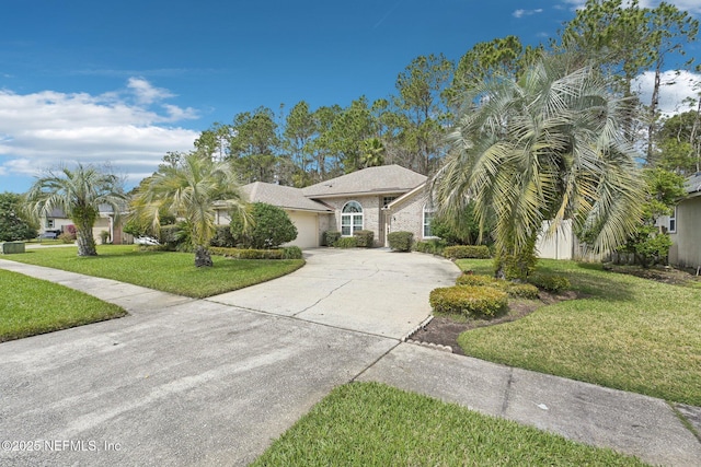 view of front of home with a front yard, driveway, and fence