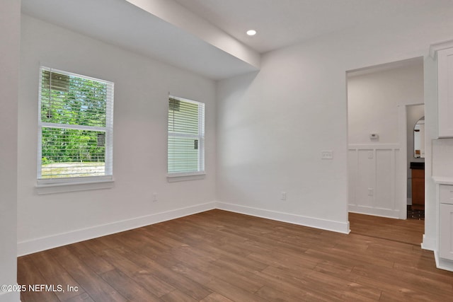 44024 Breezy Ln, Callahan, FL 32011 - spare room with plenty of natural light, wood-type flooring, baseboards, and recessed lighting