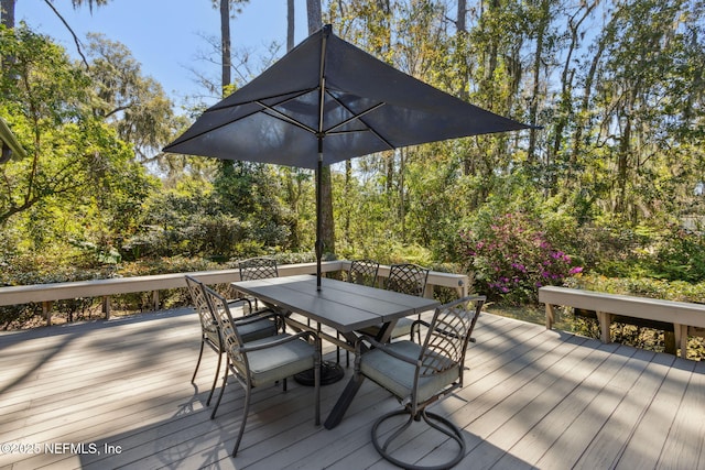 deck featuring outdoor dining space