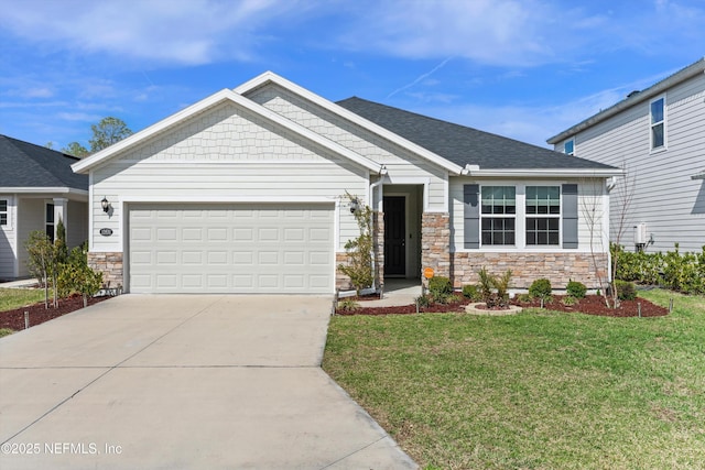 craftsman-style home with stone siding, a garage, driveway, and a front lawn