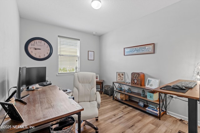 office space featuring light wood-style flooring