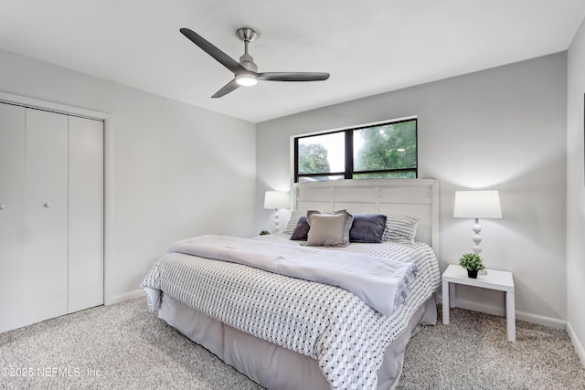 bedroom featuring a closet, carpet, a ceiling fan, and baseboards