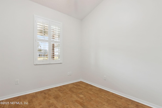 empty room with baseboards