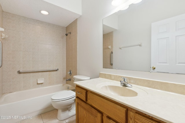 full bathroom with vanity, bathtub / shower combination, tile patterned flooring, and toilet