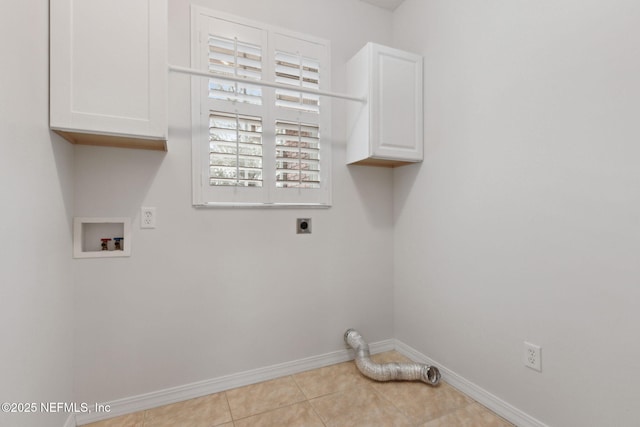 laundry room with cabinet space, light tile patterned floors, baseboards, hookup for a washing machine, and electric dryer hookup