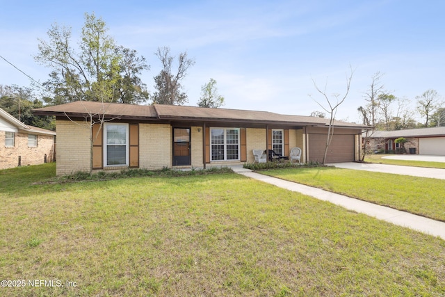 single story home featuring a garage, driveway, brick siding, and a front lawn