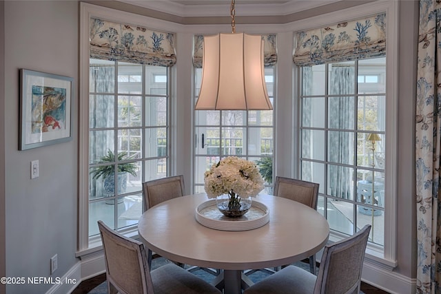 dining space with baseboards