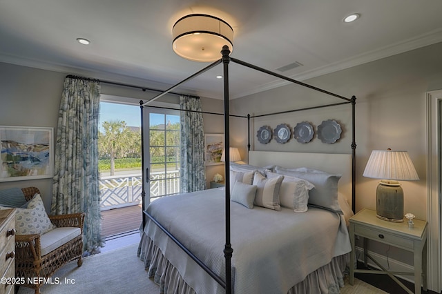 bedroom with visible vents, crown molding, and access to outside