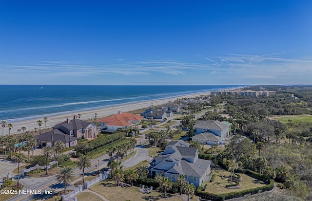 aerial view featuring a view of the beach and a water view