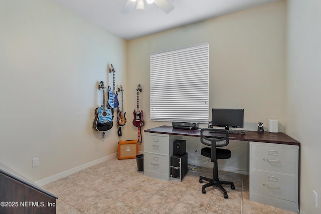 office area featuring light tile patterned flooring, ceiling fan, and baseboards