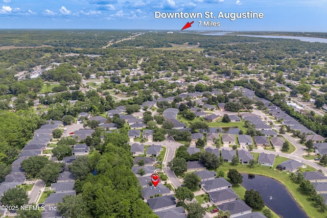 aerial view featuring a water view and a residential view