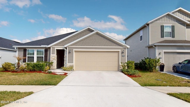 craftsman house featuring a garage, concrete driveway, stone siding, board and batten siding, and a front yard