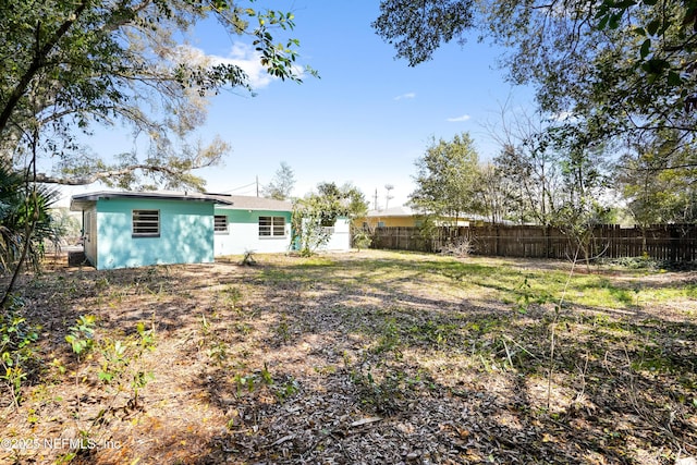 view of yard featuring fence