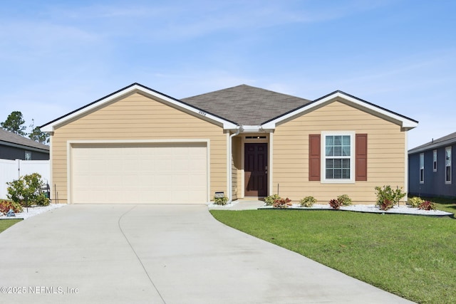 ranch-style house with driveway, roof with shingles, an attached garage, fence, and a front lawn