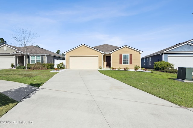 single story home with a front yard, driveway, and an attached garage