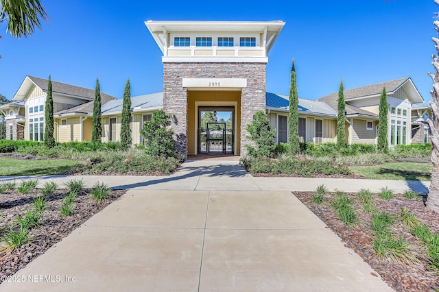 exterior space featuring stone siding