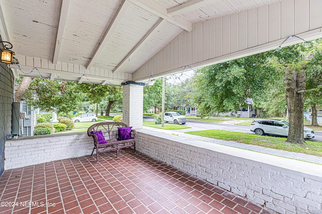 view of patio featuring a porch