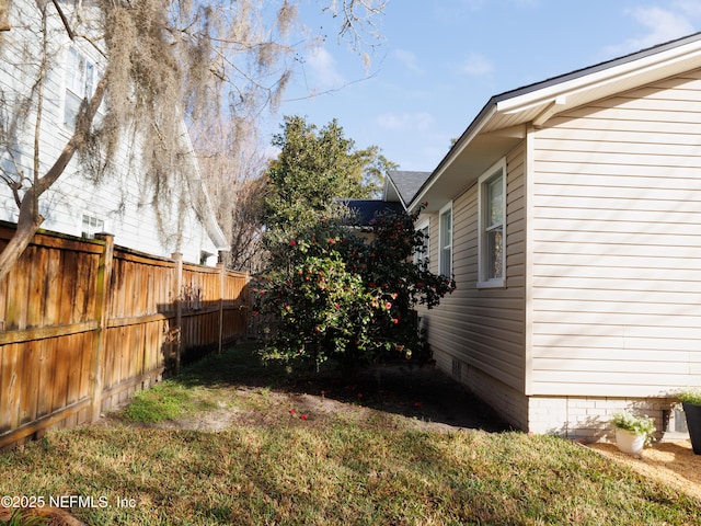 view of yard featuring fence