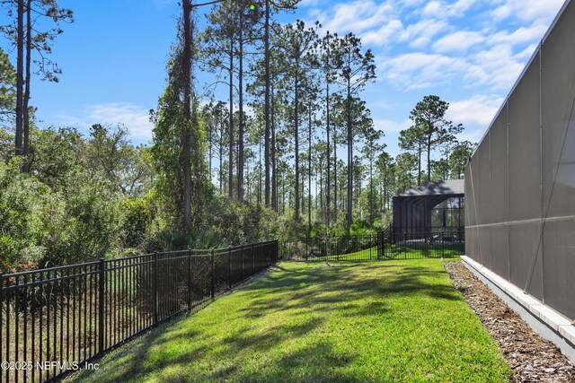 view of yard featuring fence