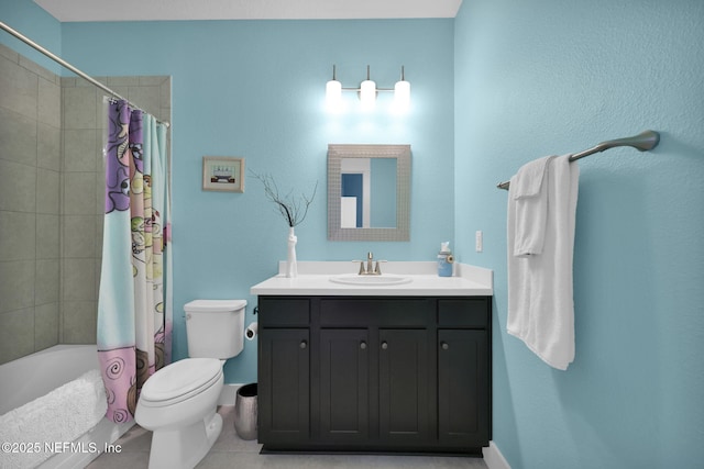 full bath with tile patterned flooring, shower / bath combination with curtain, toilet, and vanity