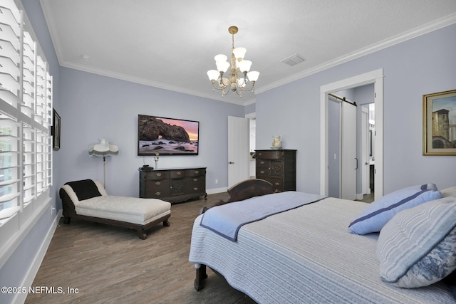 bedroom with visible vents, ornamental molding, wood finished floors, baseboards, and a chandelier