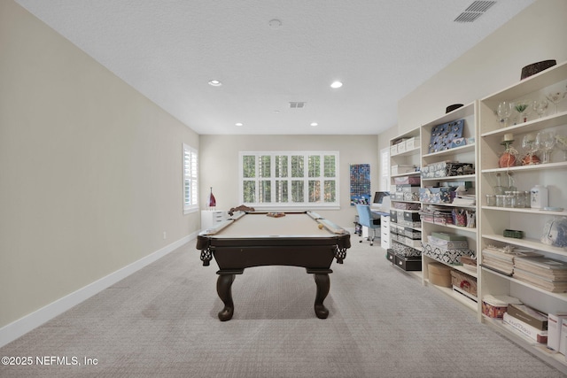 game room featuring a textured ceiling, billiards, baseboards, and carpet floors