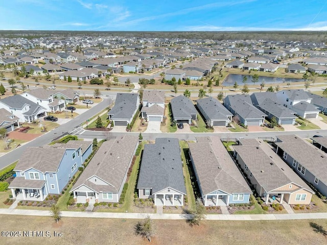 drone / aerial view with a residential view