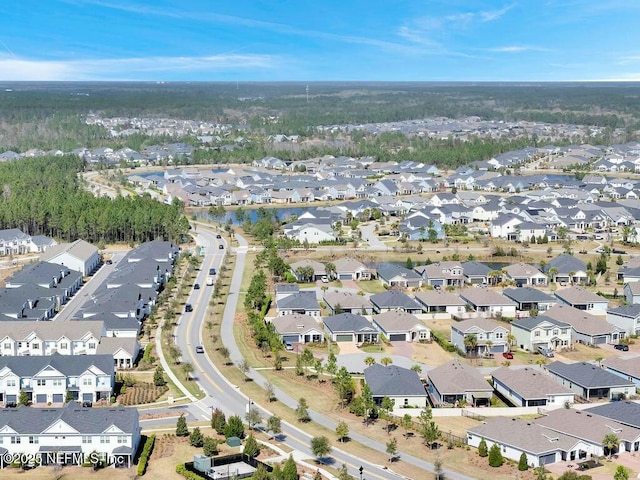 birds eye view of property with a residential view