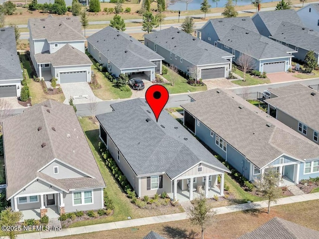 drone / aerial view with a residential view