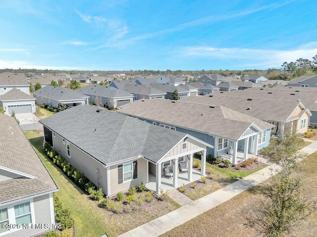 drone / aerial view featuring a residential view