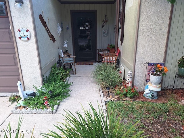 property entrance featuring a garage