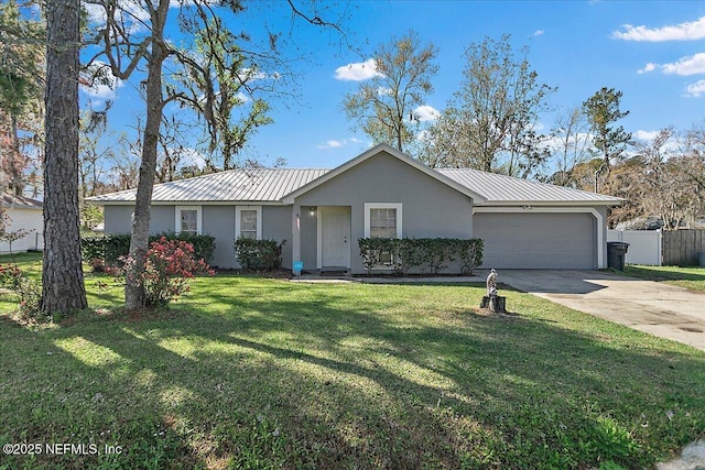 single story home featuring fence, driveway, stucco siding, a garage, and metal roof