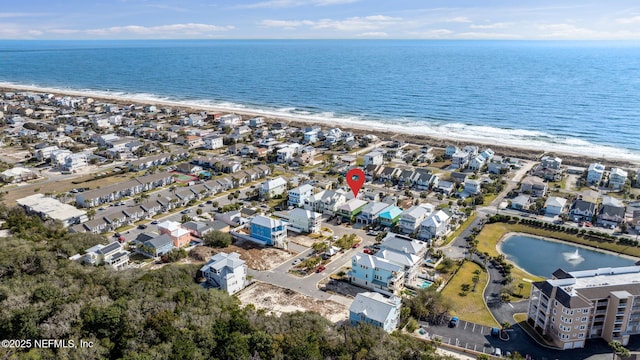 bird's eye view with a view of the beach, a residential view, and a water view