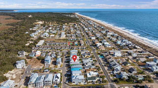 bird's eye view featuring a water view, a residential view, and a beach view