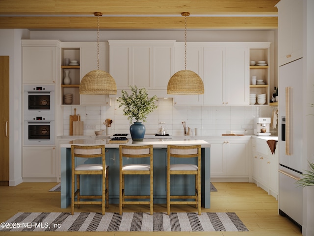 kitchen with white double oven, white cabinetry, light countertops, decorative backsplash, and open shelves