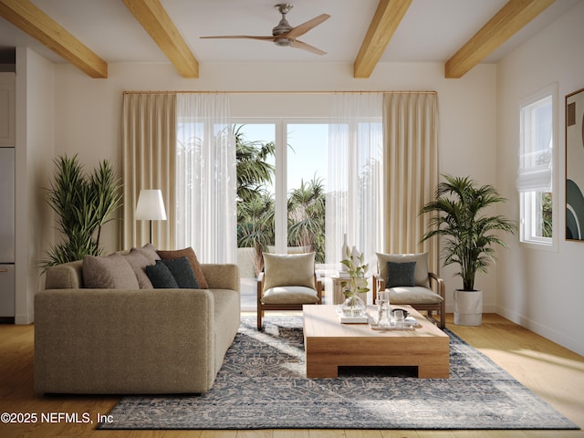 sitting room featuring ceiling fan, beamed ceiling, and baseboards