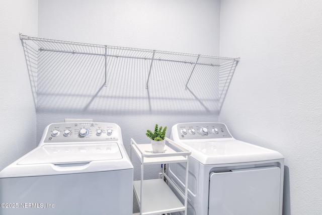 laundry room with laundry area and separate washer and dryer