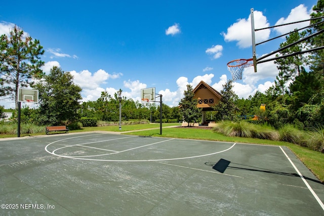 view of sport court with community basketball court and a yard