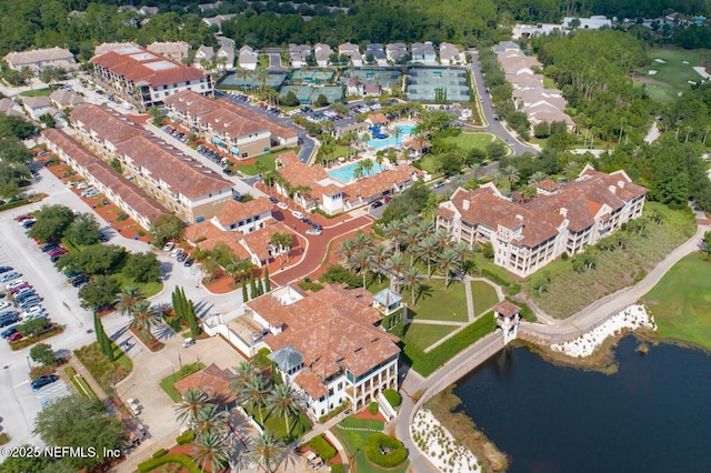 bird's eye view with a water view